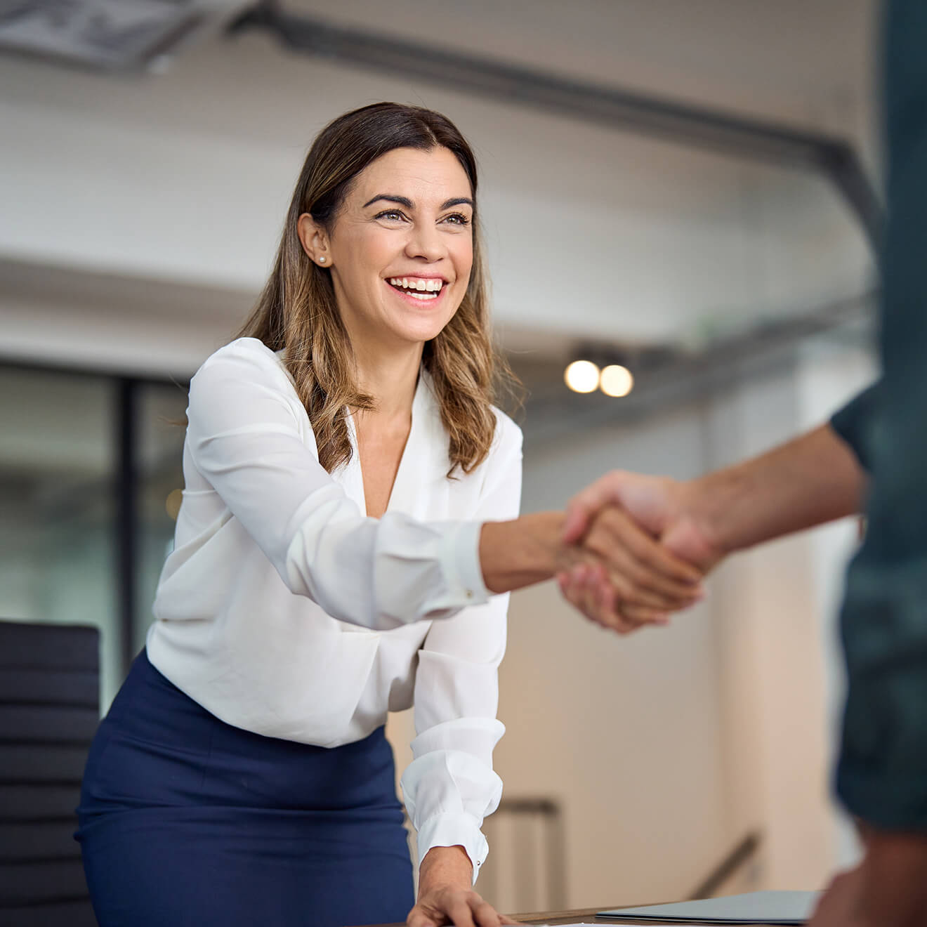 woman applying for business acquisition financing